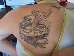 Designs such as a heart pierced with arrows expressive deep feelings of love and several elements can be incorporated with the tattoos for a richer expression. Heart Tattoos With Names Great Tattoo Idea For The Modern Woman Body Tattoo Art