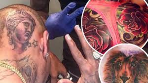 The matching skulls tattoo on both of. As Chris Brown Tattoos His Head The Worst Ever Celebrity Inkings From Cheryl To Ed Sheeran Daily Record