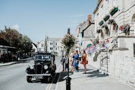 Glastonbury town is welcoming visitors, find out what to expect now the lockdown has eased. Mima And Justin Glastonbury Town Hall Somerset Ryan Goold Wedding Photography