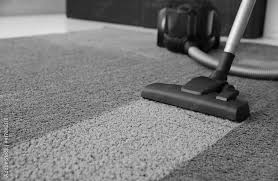modern vacuum cleaner on carpet e