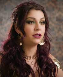 andrea russett as the mystic tv fanatic