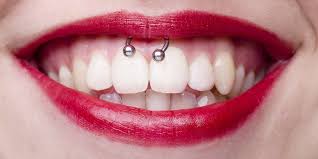 The Smiley Frenulum Piercing Everything You Need To Know