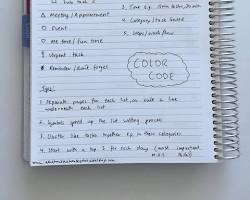 Image of person writing on a todo list on a notepad