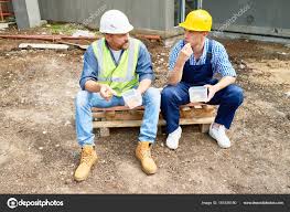 construction workers lunch stock photos