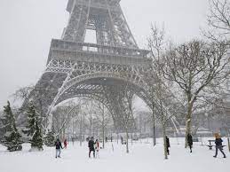 Eiffel Tower closed as Paris hammered by rain and snow | The Independent |  The Independent