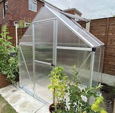 A Greenhouse To A Patio Or Concrete Base