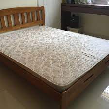 125 used solid wood queen size bed