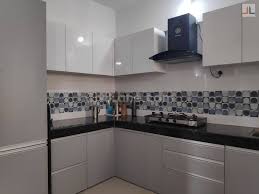 It is certainly the hottest neutral tone. Pebble Grey Laminate Finish Modular Kitchen Design Handewadi Pune 1 Civillane