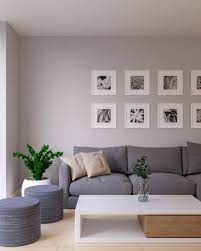 The centre of the room is highlighted by a large sectional sofa in a navy blue tone, which perfectly matches a greysih color of the walls. 7 Best Color To Paint Walls With Gray Couch With Images Roomdsign Com