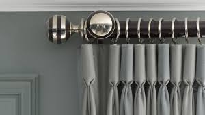 how to fix a loose curtain pole