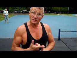 60 year old man gives workout fitness