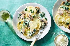 Spinach And Ricotta Ravioli In Creamy Mushroom Sauce Topped With  gambar png
