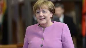 Merkel flies in for Trump meeting flanked by German CEOs
