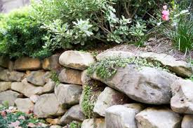 how to build a boulder retaining wall