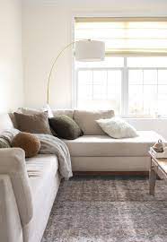 decorate a beige couch using throw pillows