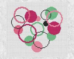 How many circles can you count in this beautiful piece? Modern Heart Cross Stitch Pattern Printable Circles Heart Etsy In 2021 Cross Stitch Heart Free Cross Stitch Charts Cross Stitch