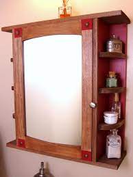 To hide the tub motor, air pump, transformer and plumbing, a cabinet is built between the tub and the wall. How To Build A Bathroom Medicine Cabinet How Tos Diy