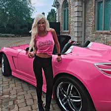 Rumble — brown dog drives pink barbie toy car. Real Life Barbie Doll
