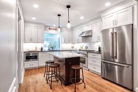 Metallic accessories and stainless steel appliances also add to the flavor of this kitchen spotted on. White Cabinets And Stainless Appliances Ideas Photos Houzz