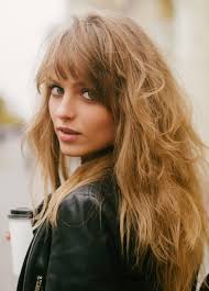 The long bangs can be brushed to the side or styled to frame your face. 7 Gorgeous Medium Length Hairstyles For Women With Thick Hair