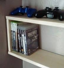 Get rid of the cases with this diy wii game storage solution at infarrantly creative. Diy Video Game And Dvd Shelf In 2019 Pinterest Diy Video Game Dvd Shelves Video Game Bedroom