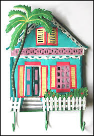 painted metal gingerbread house wall