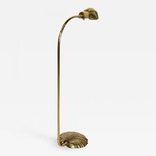First, finding a lamp with adjustable height or an adjustable neck is key. Stiffel Lamp Company Mid Century Modern Pharmacy Reading Floor Lamp Brass Seashell Shape