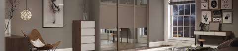 This range is available in a variety of configurations, with glass, mirror and wood effect panel. Made To Measure Sliding Wardrobe Doors B Q
