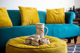 teal and yellow living room hot