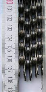 To measure the new chain, lay it on a flat surface with the rollers and plates aligned vertically. Bicycle Chain Wikipedia