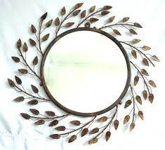 malik designs iron leaf wall mirror rs