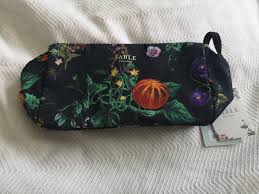 botanical pumpkin black travel pouch