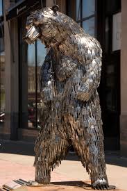 Both knives out and uncut gems have something in common: The Votes Are In Bear Piece Made Of Forks Knives Earns Sculpturewalk S People S Choice