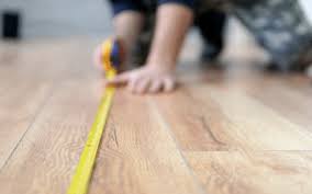 nailing hardwood floors vs glue