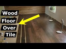 wood floors over tile pros cons