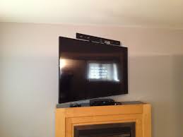 We're often asked if you can put a sound bar above a tv. Samsung Sound Bar Installed With Sound Bar Bracket Attached To The Back Of The Tv Tv Is Wall Mounted With An Sound Bar Home Theater Setup Home Theater Seating