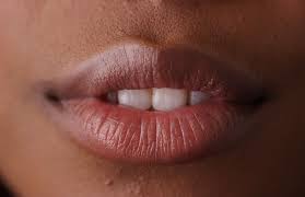 get rid of dark pigmented lips howafrica