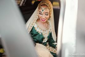 female asian wedding photographer in