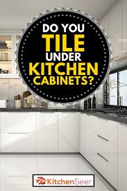 do you tile under kitchen cabinets