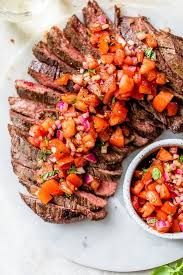 grilled steak with tomatoes red onion