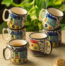 tea cups and coffee mugs with an