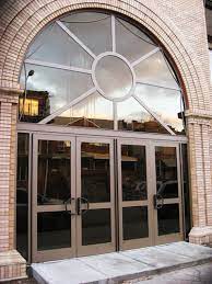 Arched Steel And Glass Entry Door