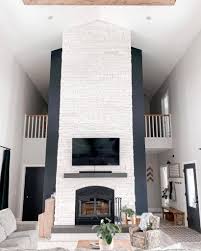 black living room wall with white stone