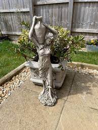 Lady With Wine Jug Stone Garden Statue