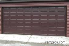 steel vs sectional wood garage door
