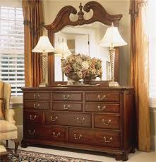 Cathedral cherry veneers, alder solids and select hardwoods create a new and exciting collection of bedroom, dining room and occasional for american drew. American Drew Cherry Grove 45th Triple Dresser With Landscape Mirror Hudson S Furniture Dresser Mirror Sets