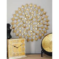 When used as decorations, flowers can helpwhen used as decorations, flowers can help soften the look of your home giving it a comfortable and inviting vibe. Litton Lane Tin Gold Bowties Orb Metal Wall Decor Set Of 3 44586 The Home Depot