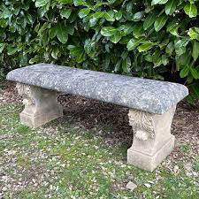 an english carved stone garden bench