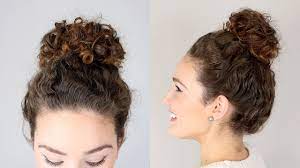messy bun hairstyle for natural curls