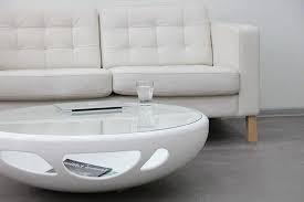 white coffee table with glass top